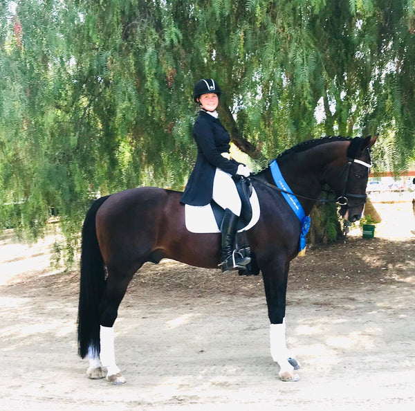 Mackenzie Hamblin and holsteiner dressage stallion Chevalier